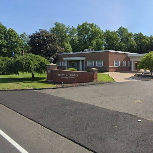 Funeral Services at Howard K. Hill Funeral Services in Bloomfield, Connecticut | FuneralHomes.fyi Howard K. Hill Funeral Services Bloomfield Connecticut
