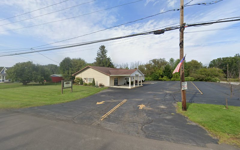 Funeral Services at Traub Funeral Home Inc in Bridgeport, New York | FuneralHomes.fyi Traub Funeral Home Inc Bridgeport New York