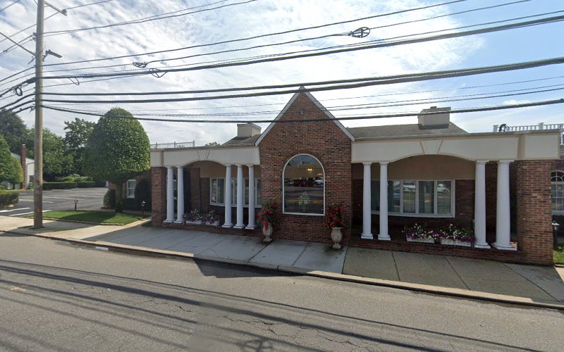 Funeral Services at William E. Law Inc. Funeral Home in Massapequa, New York | FuneralHomes.fyi William E. Law Inc. Funeral Home Massapequa New York